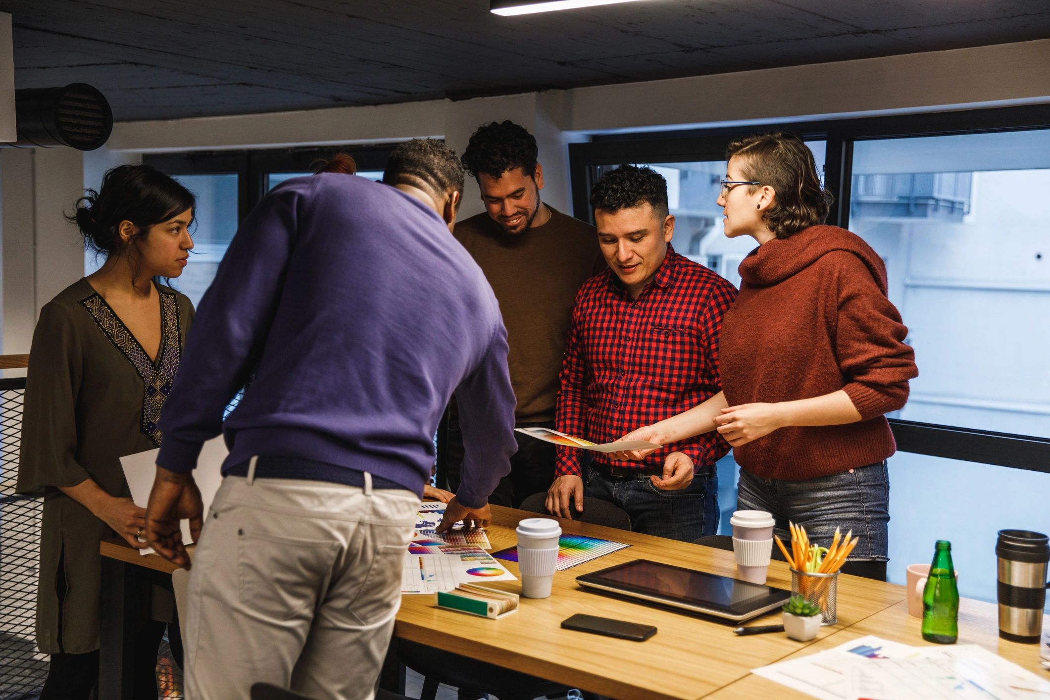 Diverse creative group collaborating on a project