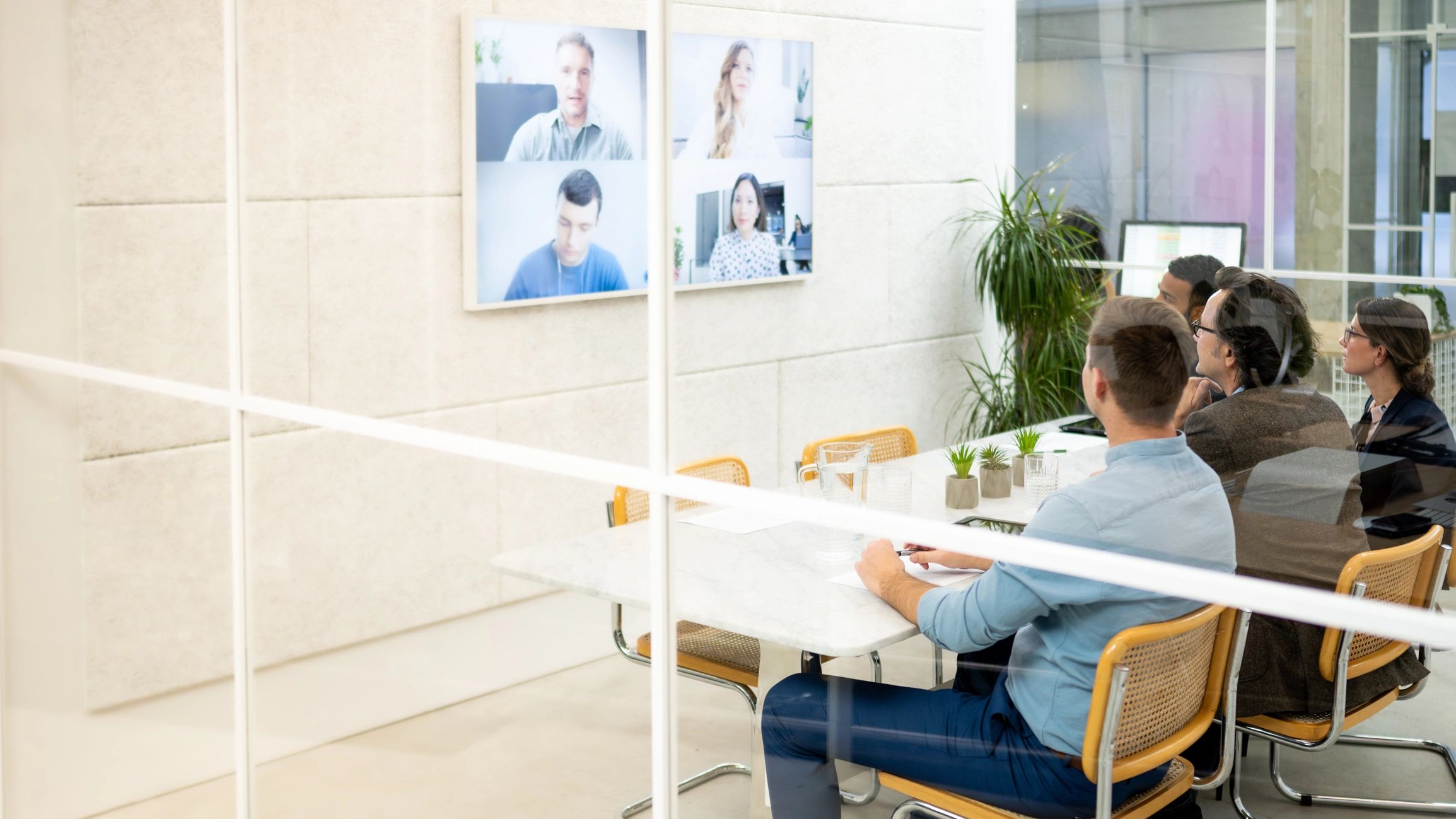 Remote market research team collaborating in a web conference