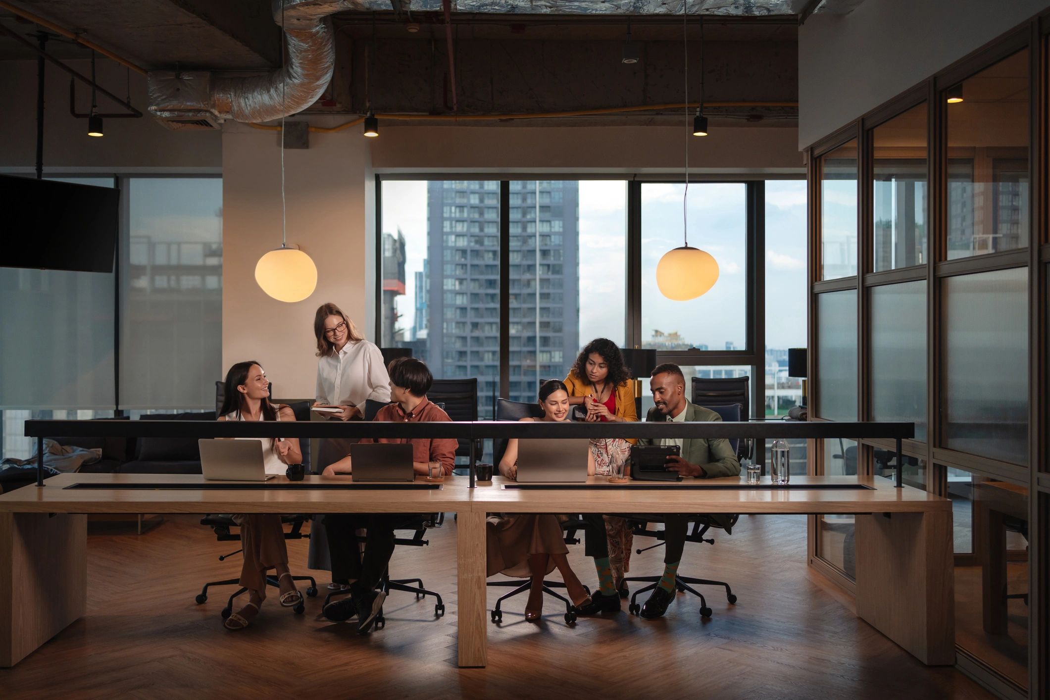 Analyst team collaborating in a modern workspace