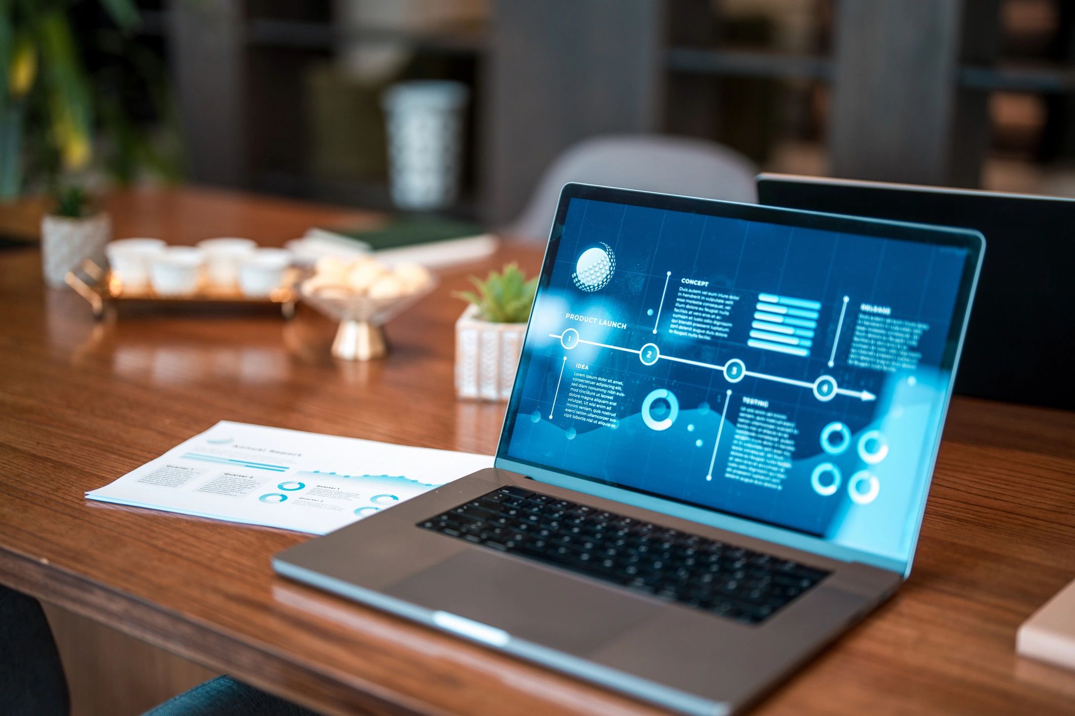 Professional workspace with laptop and documents