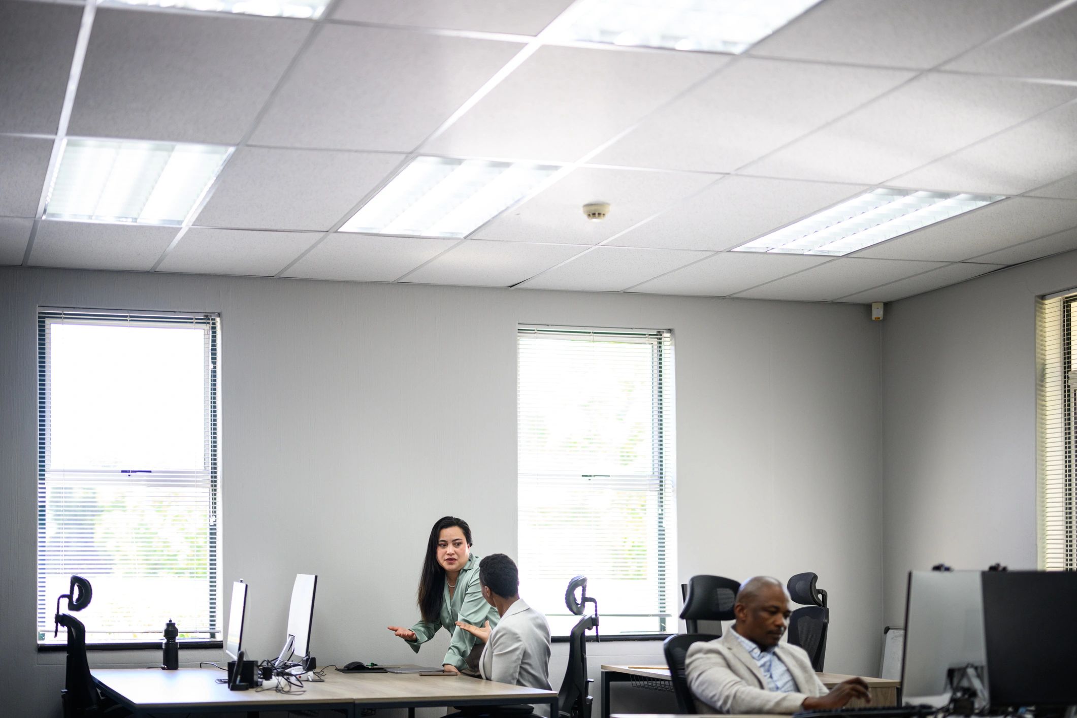 Business professionals collaborating in a bright modern office